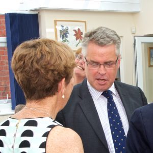 close-up-view-tim-loughton-being-photo-bombed