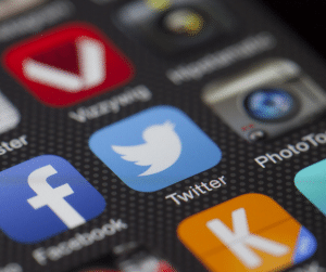 3 Things To Consider Optimising On Your Website 4 A photo of the Facebook and Twitter apps next to each other on a smartphone.